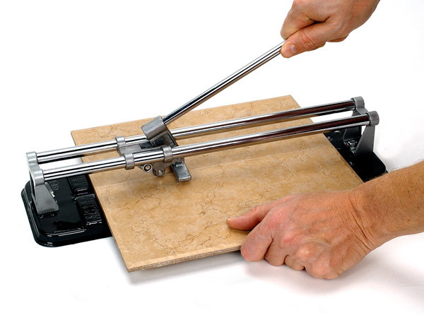 Как пользоваться ручным плиткорезом и резать им плитку